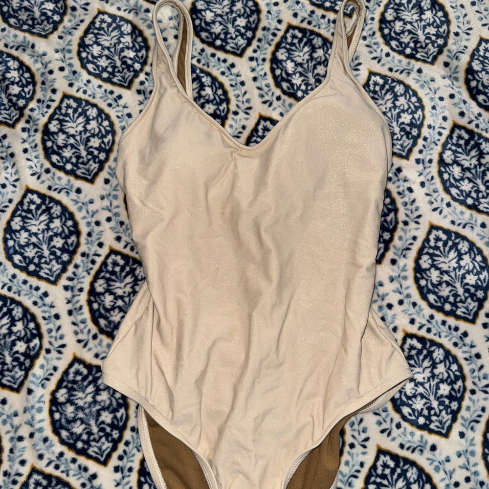 Tan One Piece Swimsuit with V Neckline and High Cut Legs